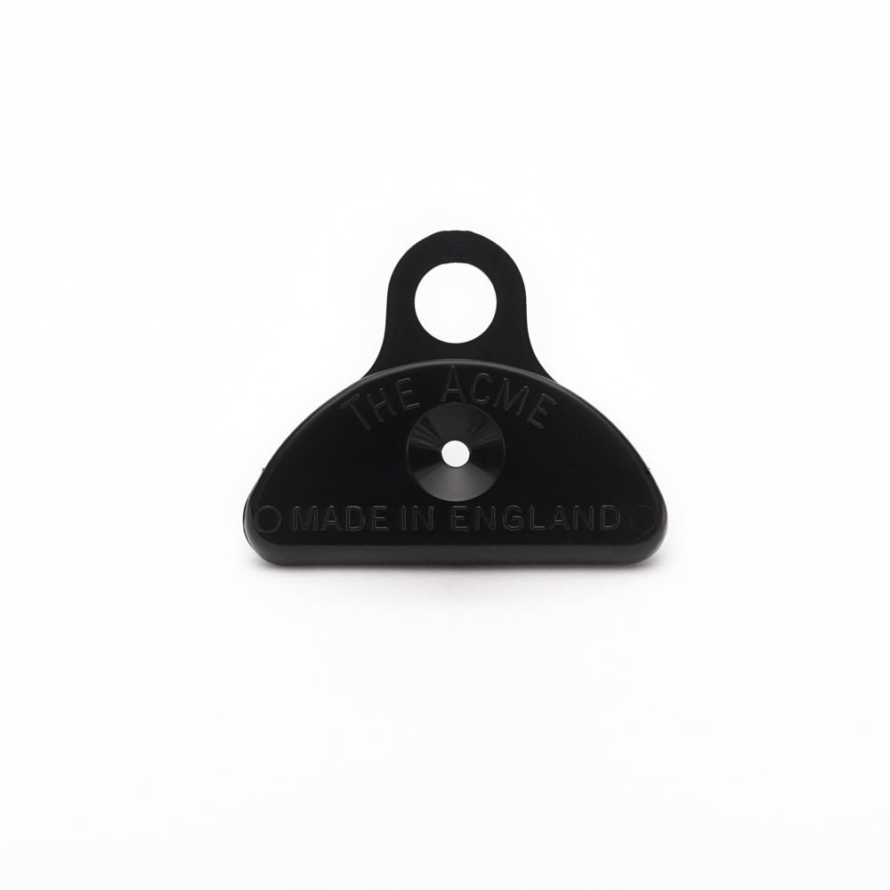 ACME Shepherds Lip 576 nickel-frame or plastic mouth dog whistle showing shape and sound hole