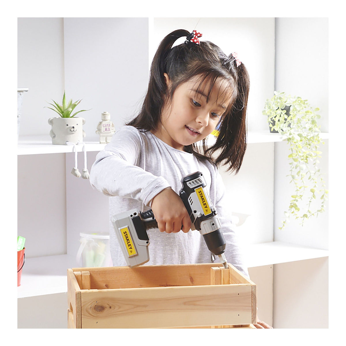 Stanley Jr. battery power tools set including toy drill and saw with yellow and black finish