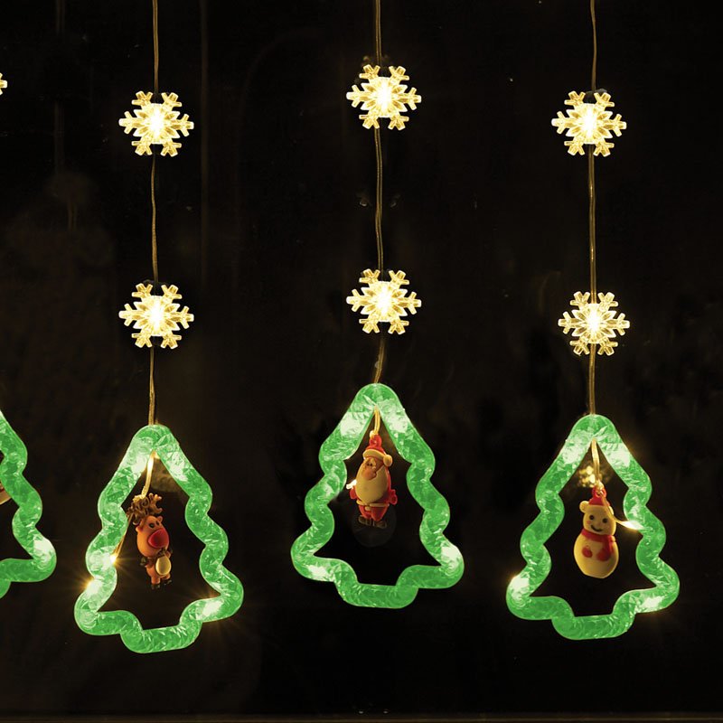 Smart Garden Warm White Christmas Tree Curtain Lights hanging illuminated outdoors