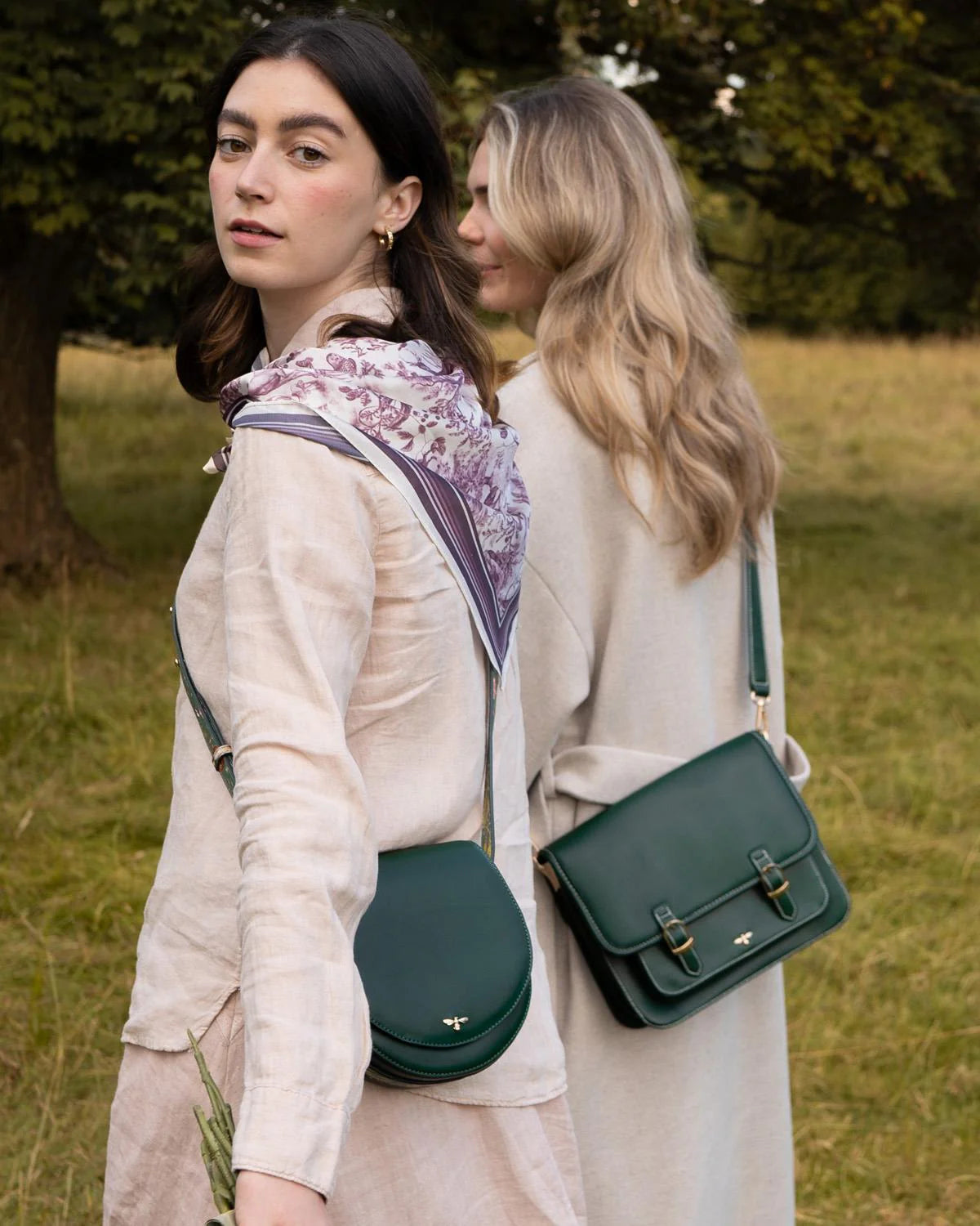Fable Into the Woods Satchel Bag in green faux leather featuring gold bee plaque and adjustable cross-body strap