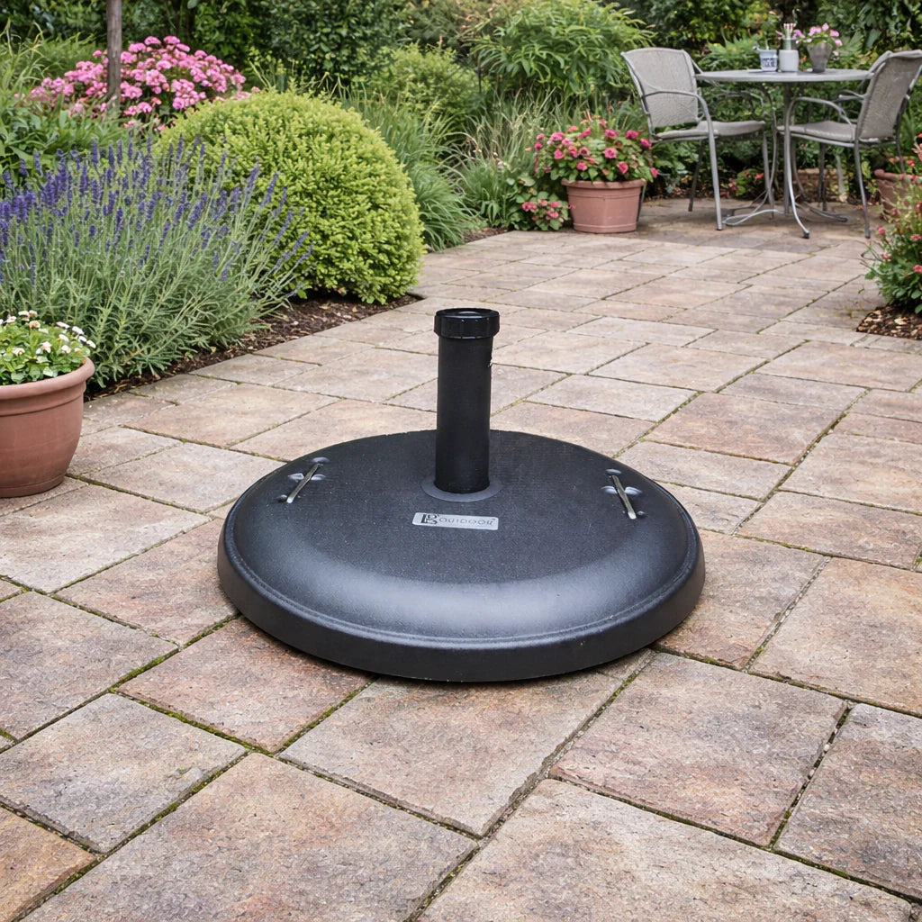 LG Outdoor heavy-duty 22kg black concrete parasol base with built-in carry handles on a stone patio.