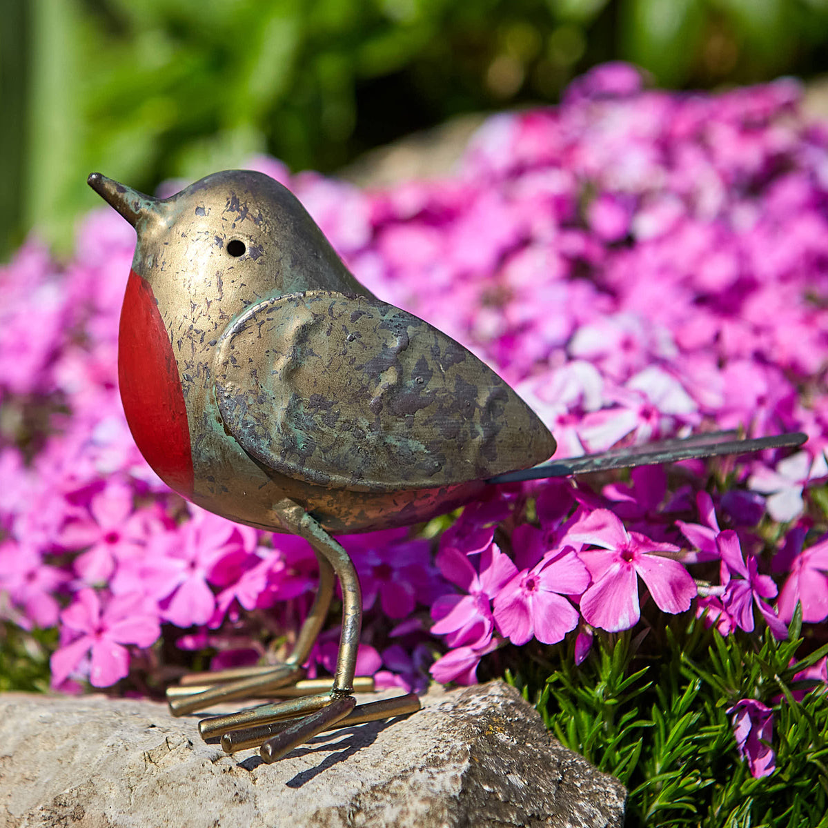Shop the Tom Chambers Decorative Robin. Antique-effect metal robin ornament with a red breast, perfect for plant pots and borders.