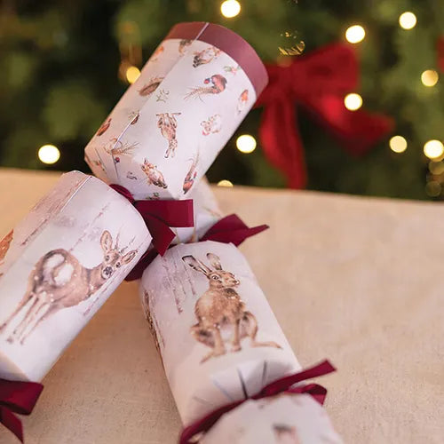 Box of six Wrendale Designs Woodland Christmas crackers featuring watercolour hare illustrations and wooden animal ornaments