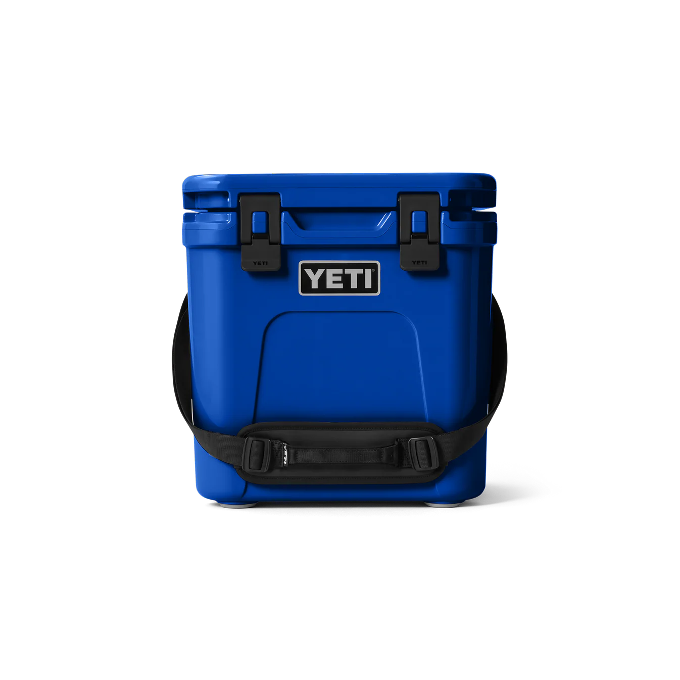 YETI Roadie 24 Cool Box in Royal Blue showing the robust upright design, haul strap, and secure latches.
