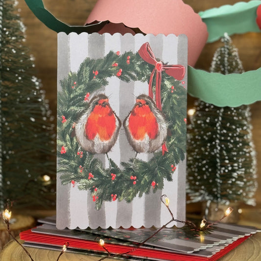 Alex Clark Robins and Wreath Doodles Christmas card pack showing illustrated festive robin cards with white envelopes.