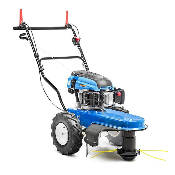 Hyundai HYFT60SP self propelled petrol wheeled grass trimmer with anti puncture tyres being used to clear thick weeds on a country estate.