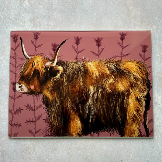Alex Clark Highland Cow glass worktop saver featuring a countryside cow illustration