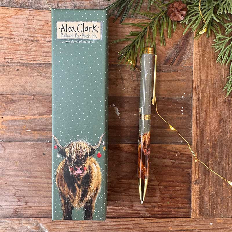 Alex Clark Highland Cows Christmas ballpoint pen featuring festive countryside cow artwork