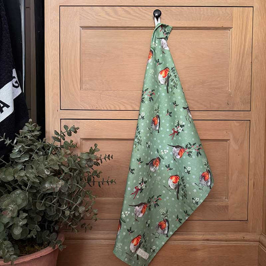 Alex Clark Highland Cows Christmas cotton tea towel featuring festive countryside cow illustrations