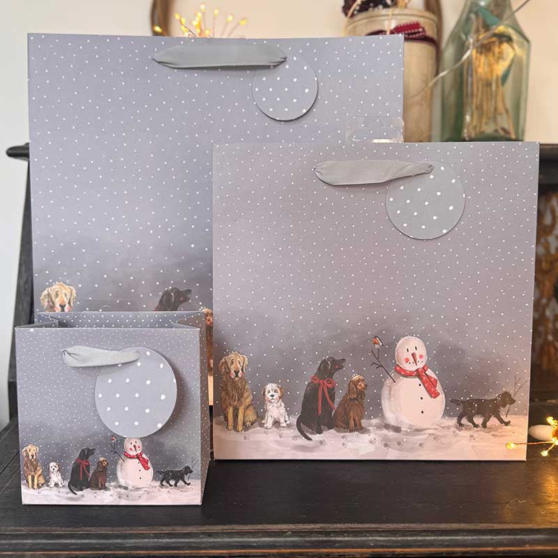 Alex Clark Dogs and Snowman Christmas gift bag featuring festive dog artwork and soft ribbon handles
