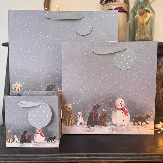 Alex Clark Dogs and Snowman Christmas gift bag featuring festive dog artwork and soft ribbon handles