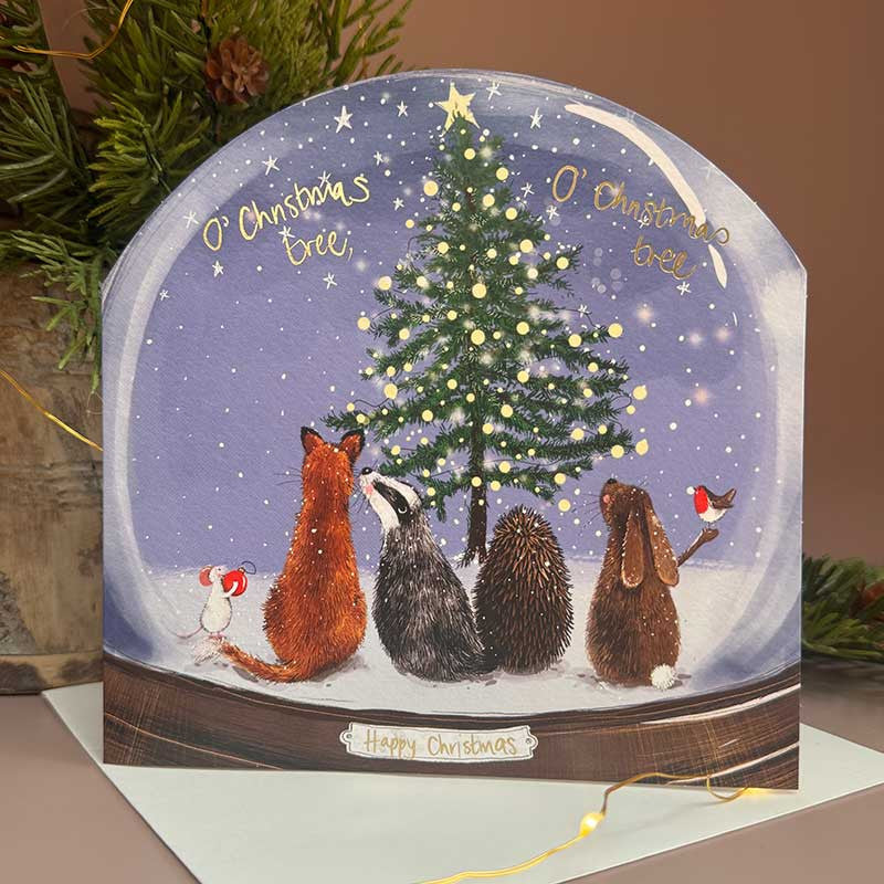 Alex Clark Woodland Animals Snow Globe greeting card depicting forest animals in a snowy scene with a white envelope.