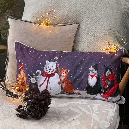 Alex Clark Cats & Snowman Christmas cushion featuring festive cat and snowman illustrations