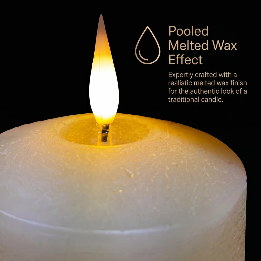 Noma set of 3 ivory flameless real wax LED pillar candles flickering on a wooden surface