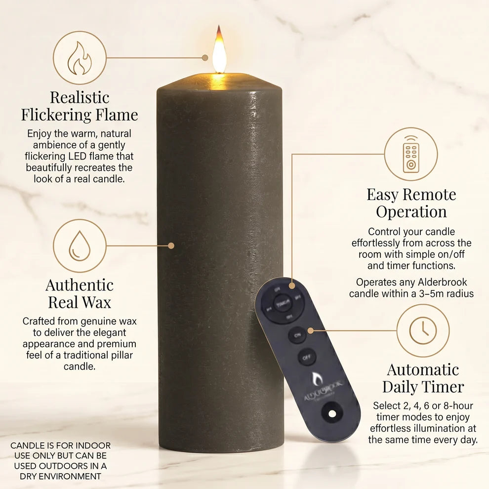 Noma set of 3 pewter flameless LED pillar candles displaying a warm flickering flame effect