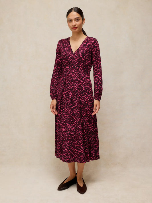 Women's White Stuff Megan long-sleeve midi dress featuring a classic fit, V-neckline, and fluid jersey drape.