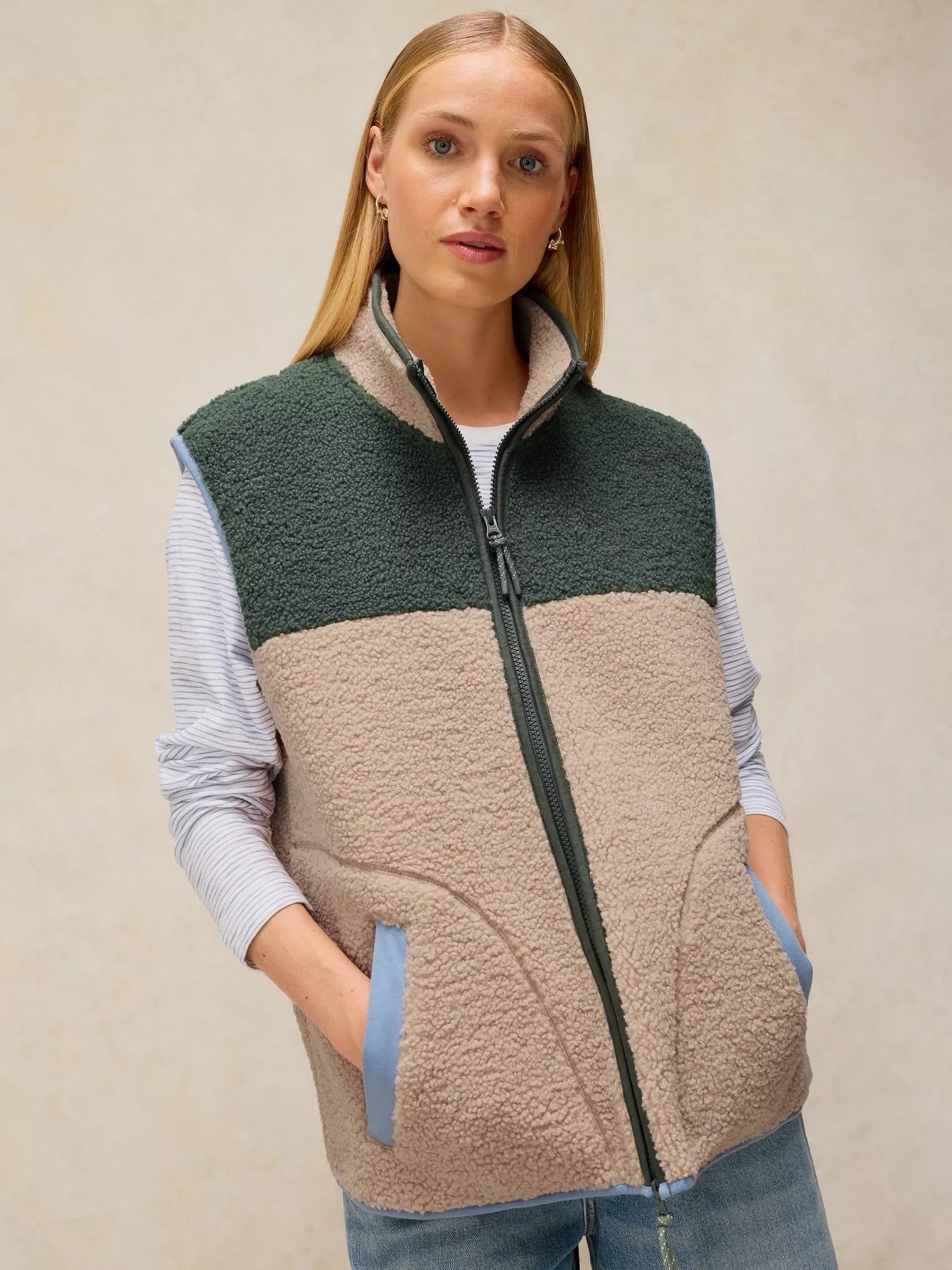 White Stuff Borg Gilet featuring a high neck and sleeveless design, ideal for practical outdoor layering.