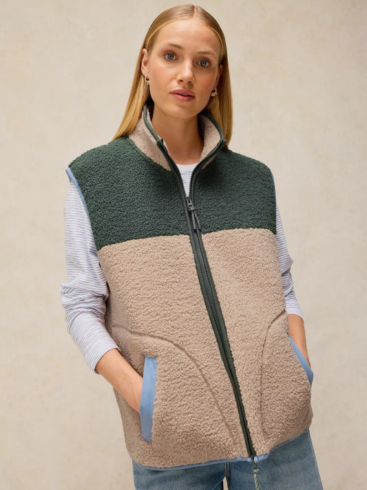 White Stuff Borg Gilet featuring a high neck and sleeveless design, ideal for practical outdoor layering.