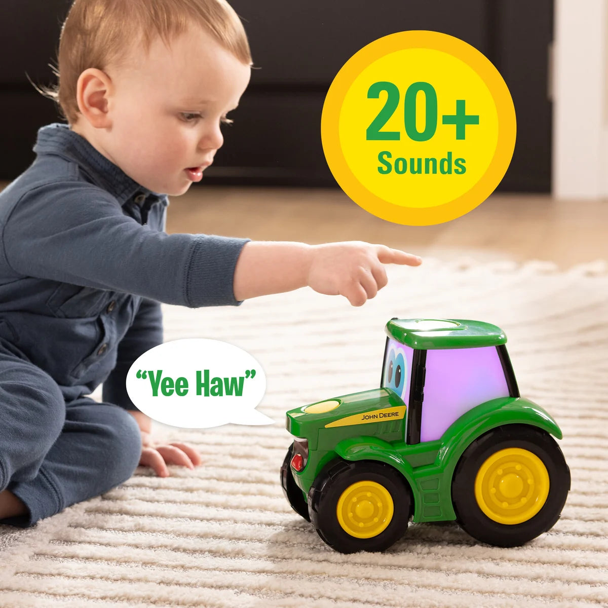 John Deere Lights & Sounds Johnny Tractor toddler toy showing cheerful eyes and green bonnet