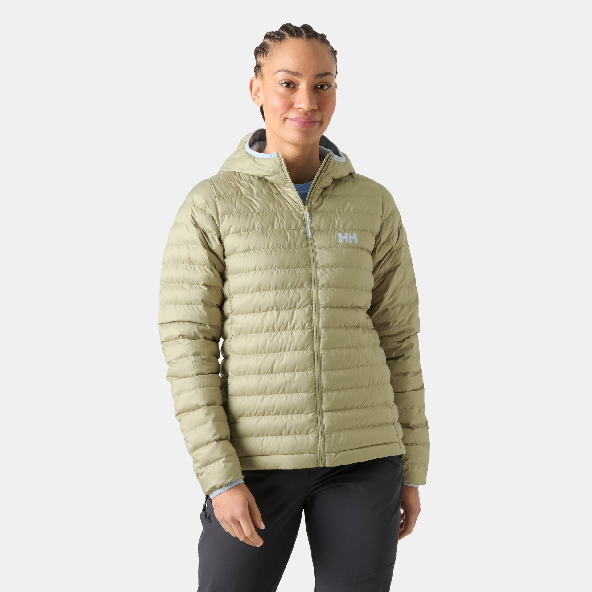 Women's Helly Hansen Sirdal hooded insulated jacket in a sleek, lightweight design with zippered hand pockets, shown from the front.
