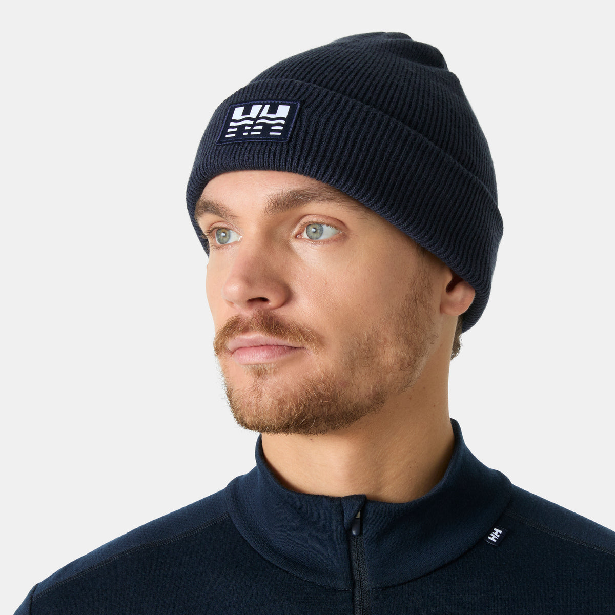 Helly Hansen Sea Gear Beanie Hat showing retro logo patch and ribbed turn-up cuff