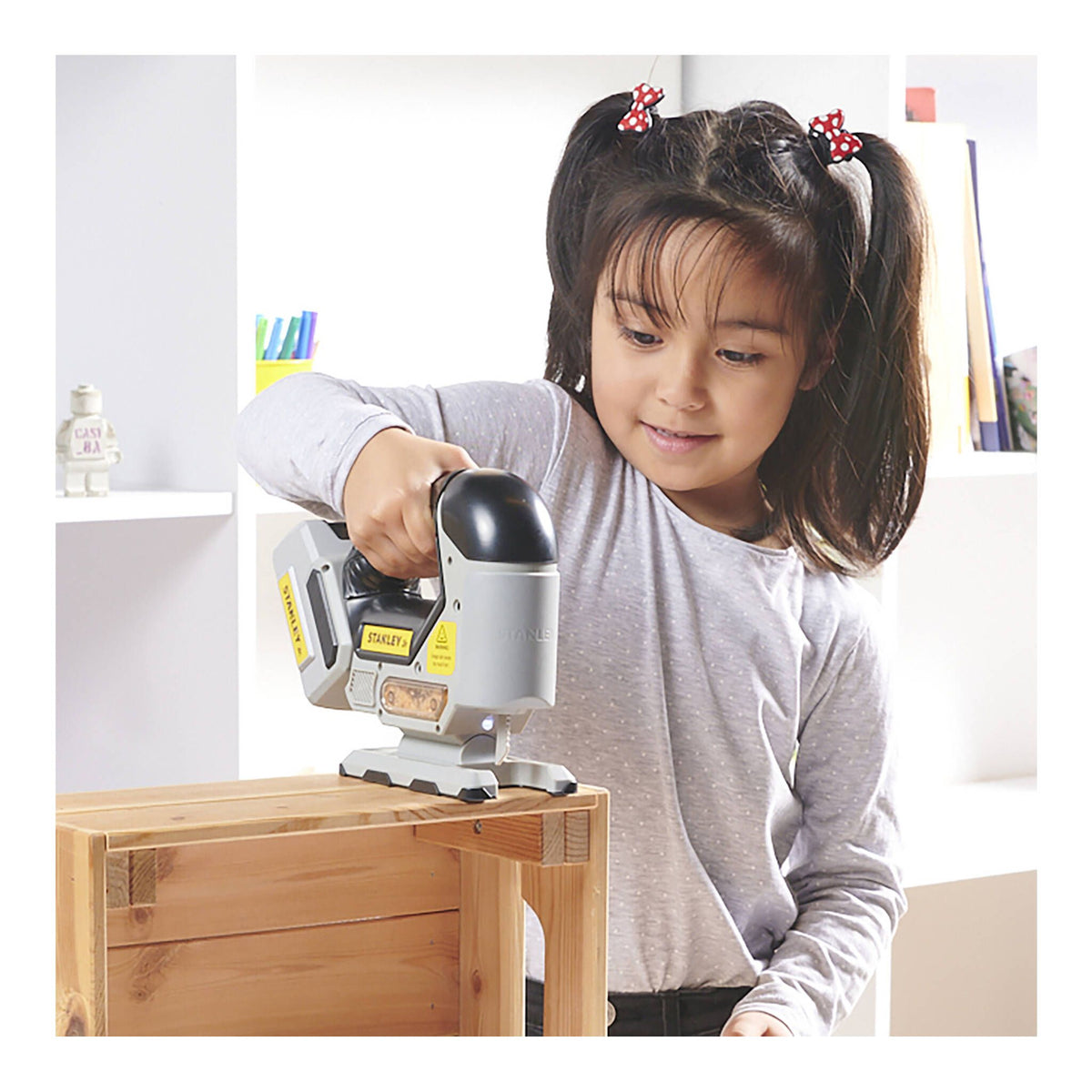 Stanley Jr. battery power tools set including toy drill and saw with yellow and black finish