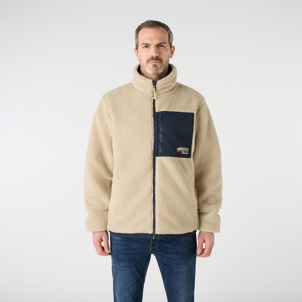 Musto Men's Snug Reversible Pile Jacket in soft fleece featuring full zip closure and chest pocket.