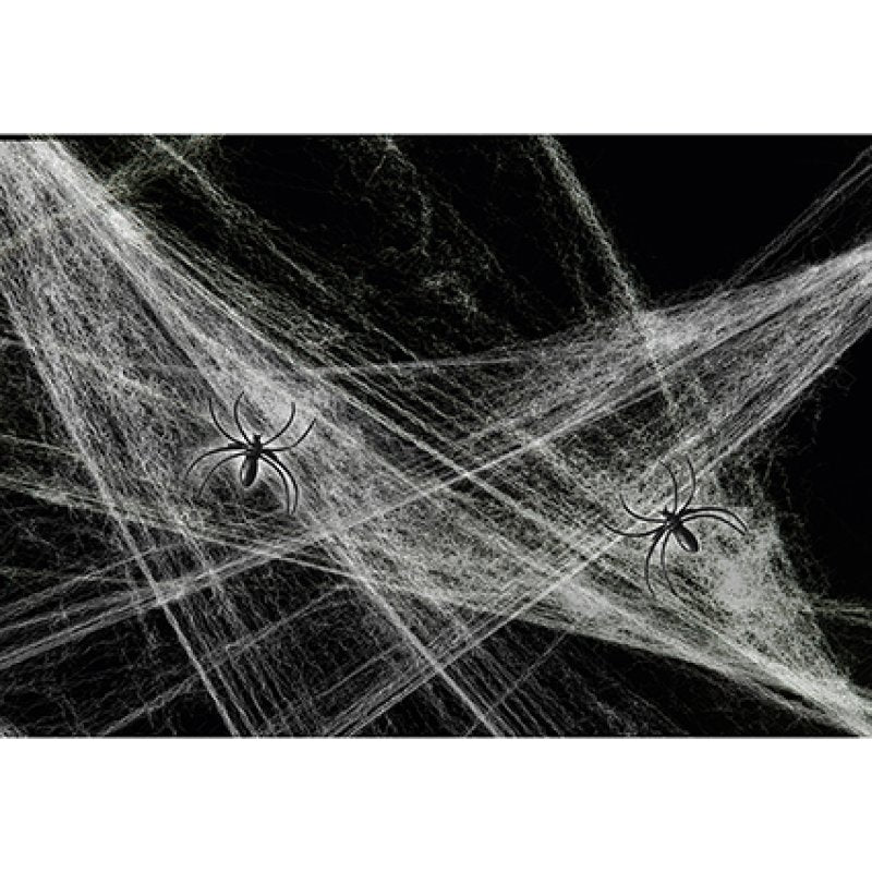 Premier white stretchable cotton style cobweb Halloween decoration draped over a surface with two black plastic spiders attached.