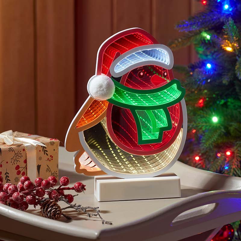Smart Garden RobinFinity 28cm tabletop infinity robin light illuminated on a surface