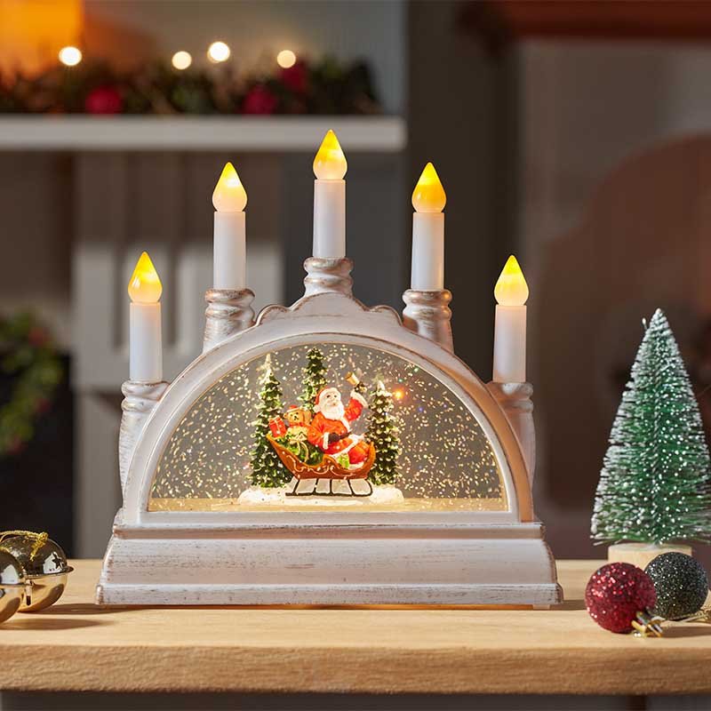 Smart Garden SnowSwirl Santa candle bridge LED Christmas ornament with continuous swirling glitter effect