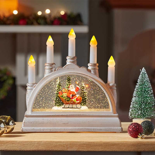 Smart Garden SnowSwirl Santa candle bridge LED Christmas ornament with continuous swirling glitter effect