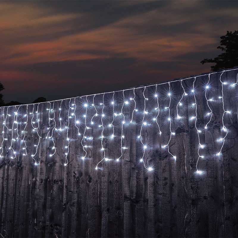 Smart Garden 250 LED Icicle Lights Warm White LV displayed along a roofline