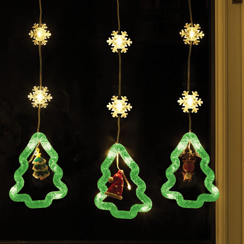 Smart Garden Warm White Christmas Tree Curtain Lights hanging illuminated outdoors