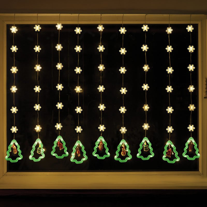 Smart Garden Warm White Christmas Tree Curtain Lights hanging illuminated outdoors
