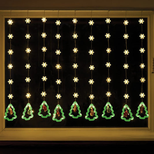 Smart Garden Warm White Christmas Tree Curtain Lights hanging illuminated outdoors