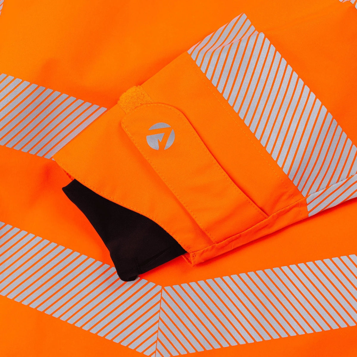 Arbortec ATHV4420 BreatheDry women's high-visibility orange waterproof railway and arborist work jacket with reflective tape detailing