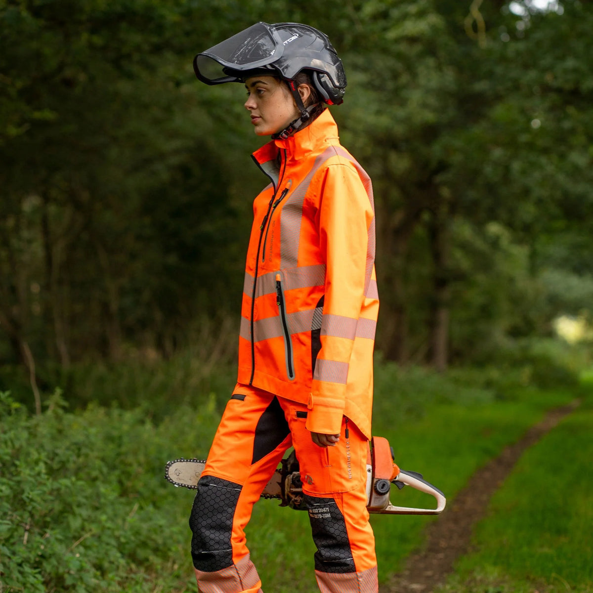 Arbortec ATHV4420 BreatheDry women's high-visibility orange waterproof railway and arborist work jacket with reflective tape detailing
