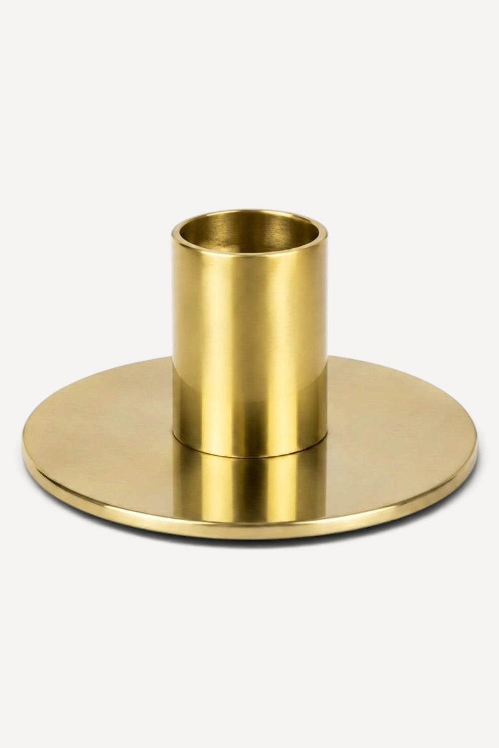 Ashleigh & Burwood brushed gold single dinner candle holder with wide circular base on a white background.