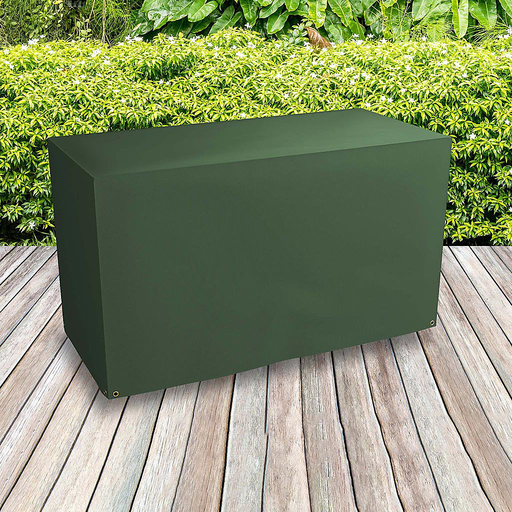 Bosmere Protector 2000 green reversible wagon barbecue cover fitted securely on an outdoor decking area