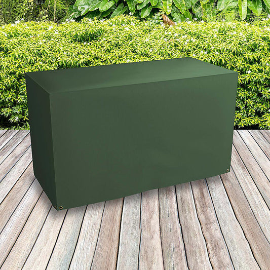 Bosmere Protector 2000 green reversible wagon barbecue cover fitted securely on an outdoor decking area