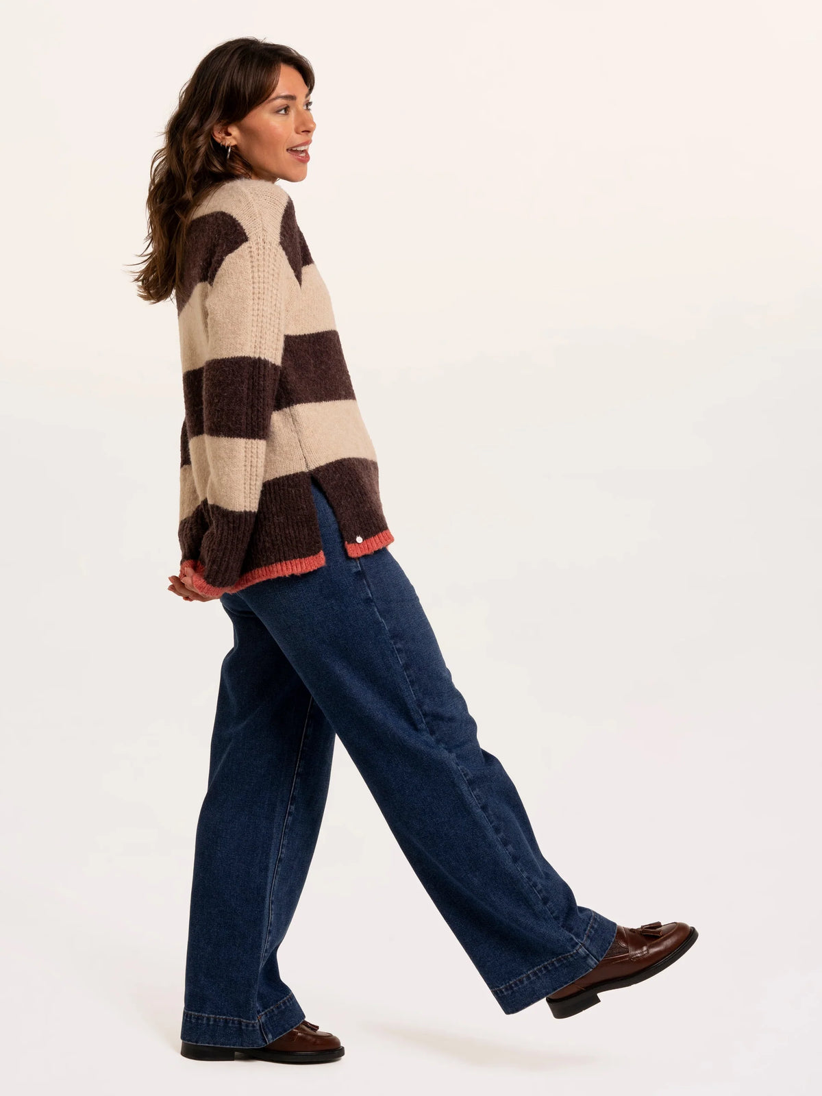 Brakeburn Eira Stripe Crew Neck Knitted Jumper in brown and cream styled with dark denim jeans