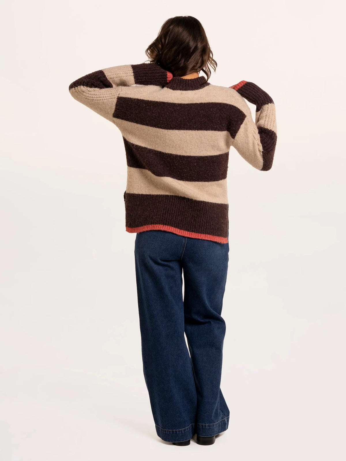 Brakeburn Eira Stripe Crew Neck Knitted Jumper in brown and cream styled with dark denim jeans