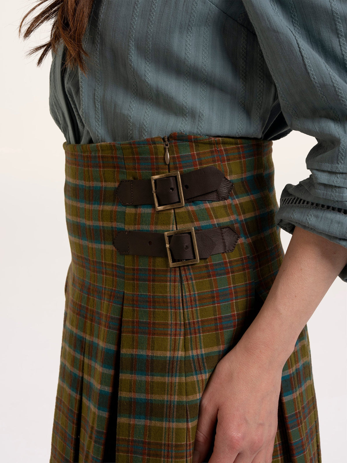 Brakeburn Red Cedar Check Pleated Kilt Skirt styled with a cream cable knit jumper and brown boots