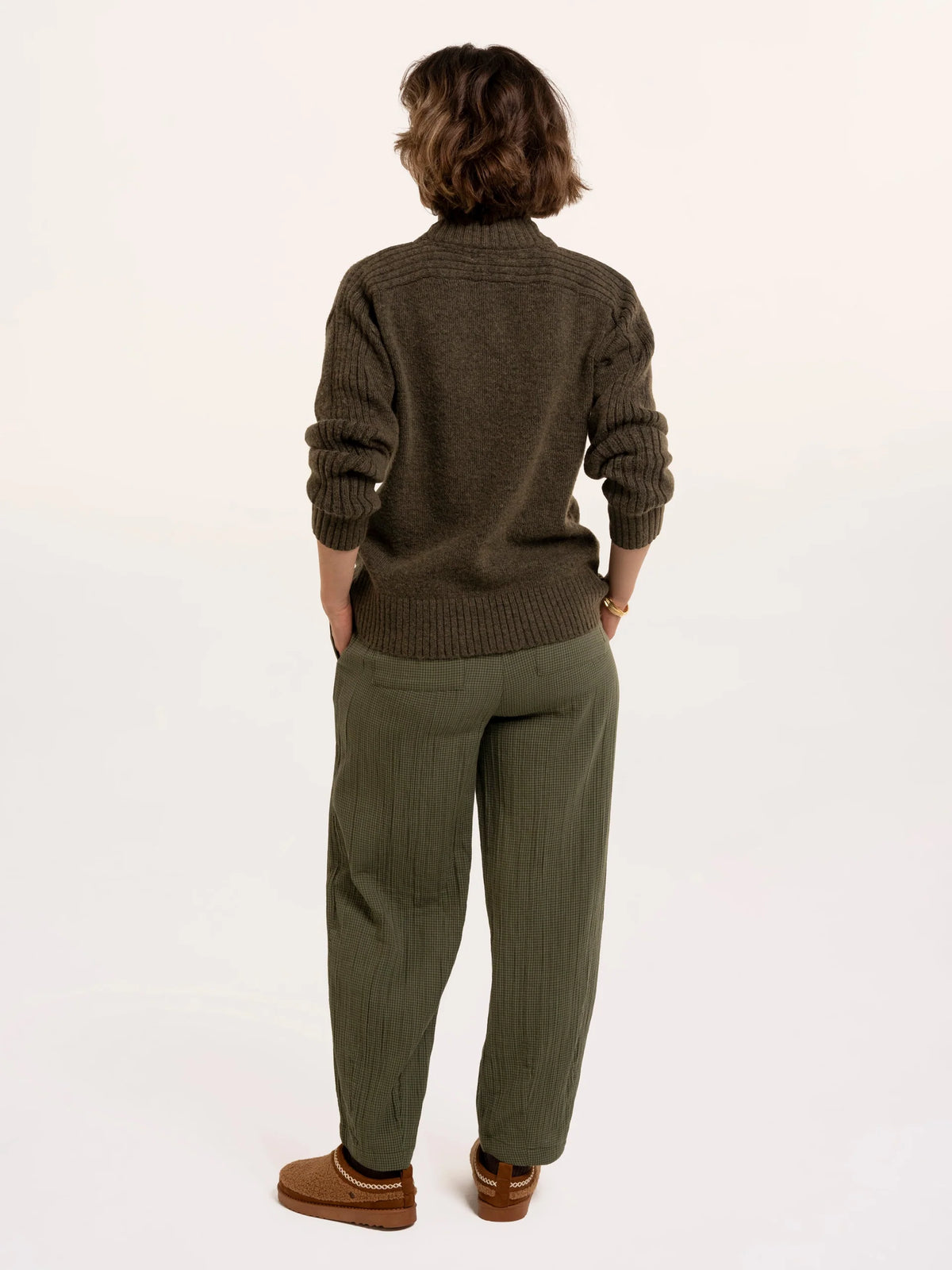 Brakeburn Signe Stitch Detail Knitted Roll Neck Jumper in olive green styled with burgundy corduroy trousers