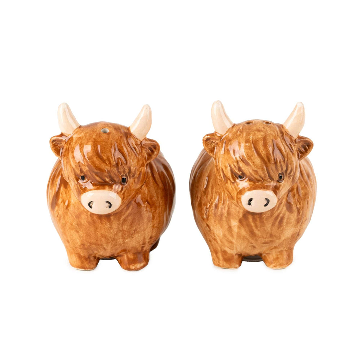 Candlelight pair of 3D Highland cow ceramic salt and pepper shakers with brown glazed finish and horn details
