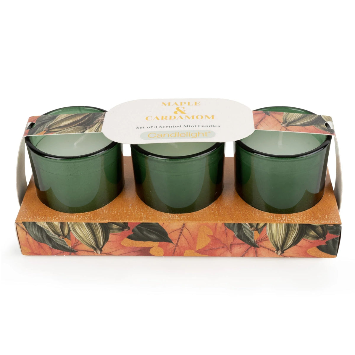 Candlelight Maple and Cardamom set of 3 mini votive candles in green glass holders presented in autumn leaf patterned packaging