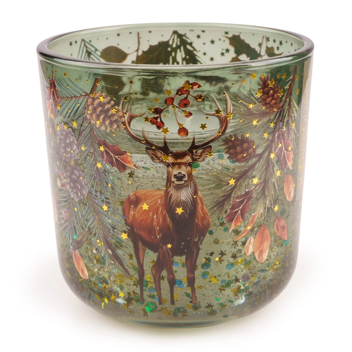Candlelight Pine Forest LED candle in a green glass holder decorated with a stag, pine branches, and gold star accents