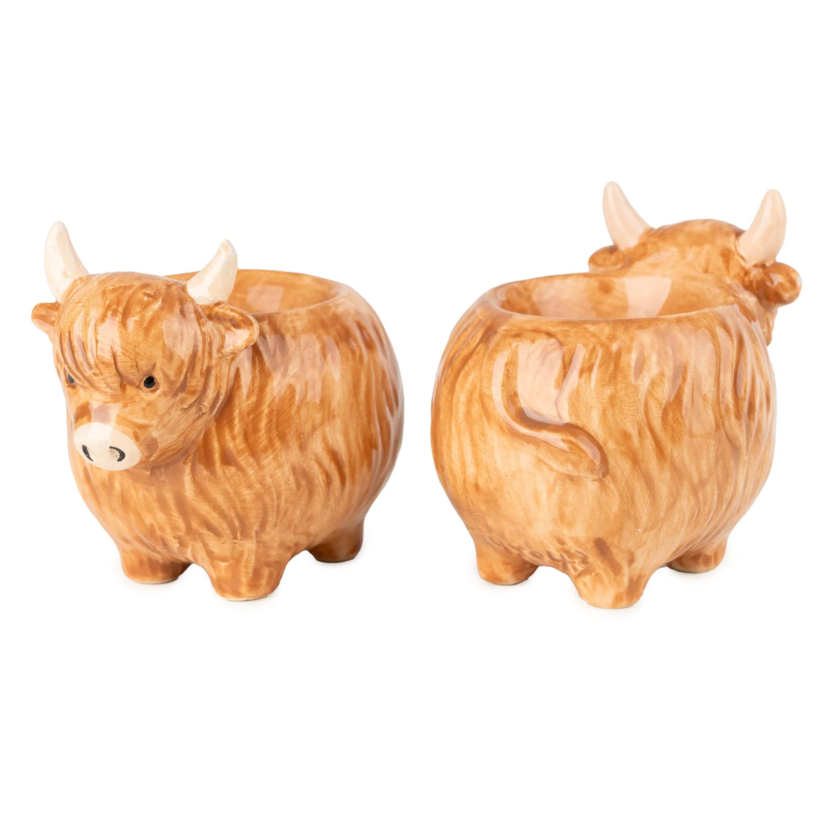 Candlelight Set of 2 Highland Cow ceramic 3D shaped egg cups with painted horns and shaggy brown coat details