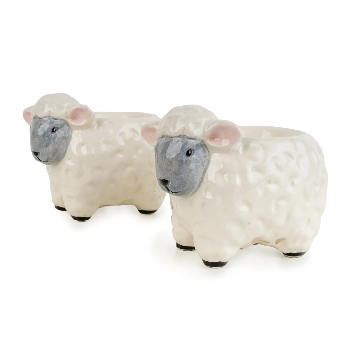 Candlelight Set of 2 Sheep ceramic 3D shaped egg cups with white glossy glaze, grey faces, and pink ears