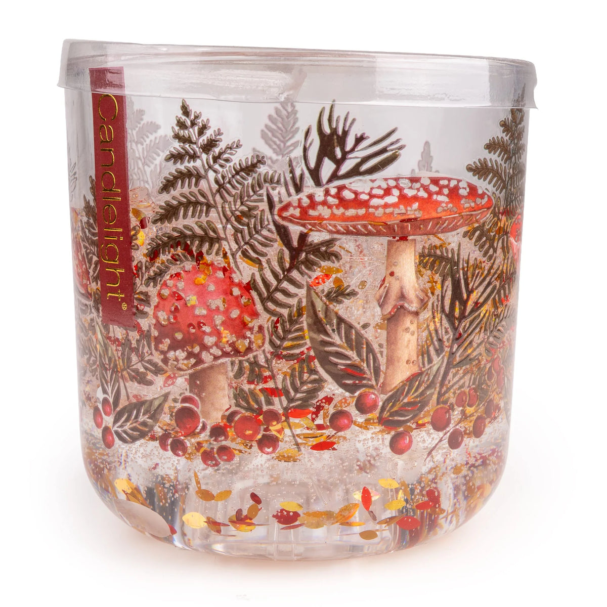 Candlelight Toadstools Flora and Fauna LED candle in a printed clear glass vessel with red toadstools and fern foliage